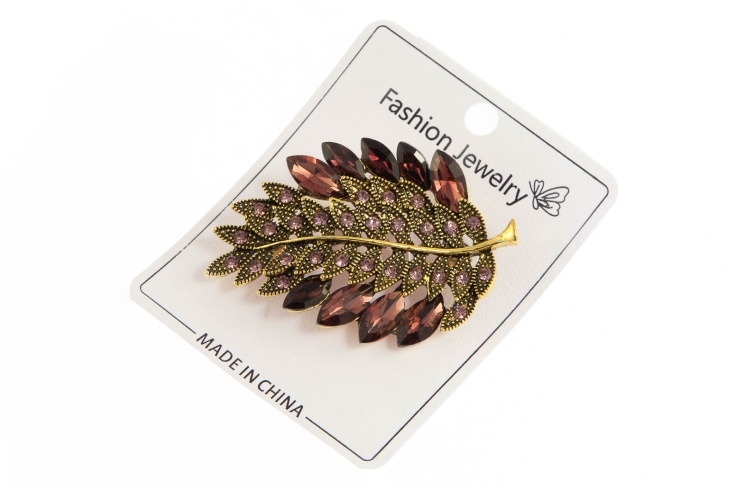 Elegancka broszka liść