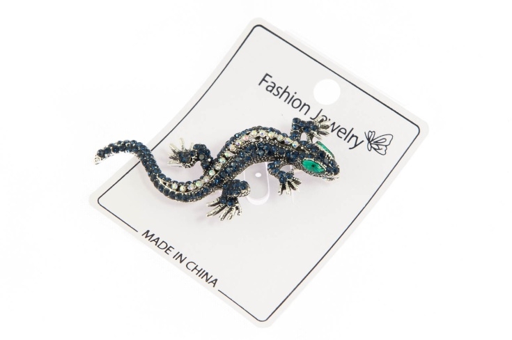 Elegancka broszka jaszczurka